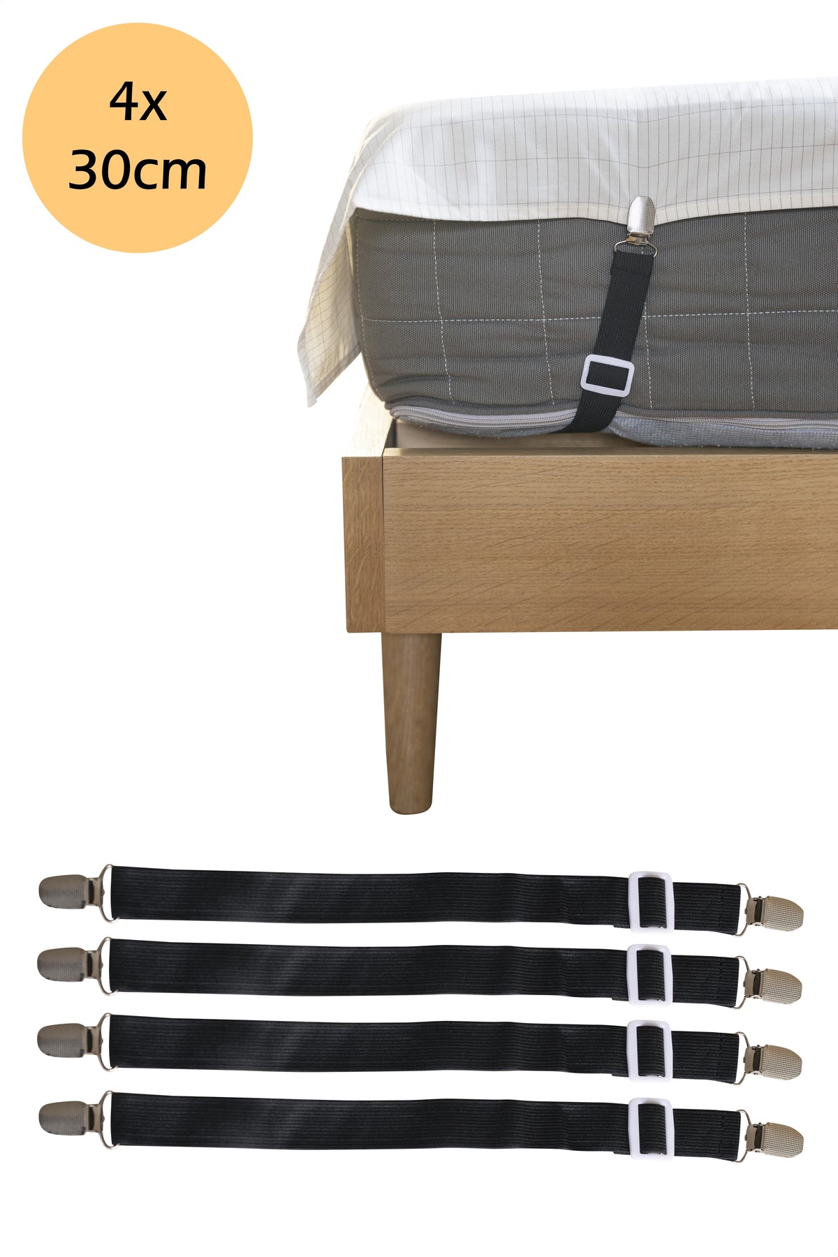 Set von vier Earthle Spannbändern mit 30 cm Länge, mit einem Erdungslaken straff über der Matratze